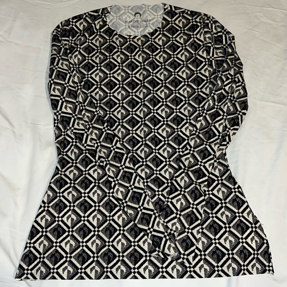 Crescent Moon top from marine serre featuring a round neck, long sleeves,